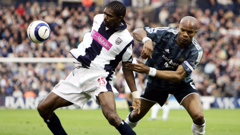 Football - West Bromwich Albion v Newcastle United FA Barclays Premiership  - The Hawthorns - 30/10/05 
West Brom's Nwankwo Kanu and Newcastle's Jean Alain Boumsong in action 
 / Alex Morton 
Livepic 
NO ONLINE/INTERNET USE WITHOUT A LICENCE FROM THE FOOTBALL DATA CO LTD.,Image: 449814011, License: Rights-managed, Restrictions: 01, Model Release: no, Credit line: AI Project / Reuters / Forum