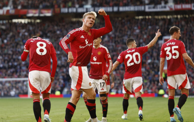 Soccer Football - Premier League - Manchester United v Brentford - Old Trafford, Manchester, Britain - October 19, 2024 Manchester United's Rasmus Hojlund celebrates scoring their second goal  EDITORIAL USE ONLY. NO USE WITH UNAUTHORIZED AUDIO, VIDEO, DATA, FIXTURE LISTS, CLUB/LEAGUE LOGOS OR 'LIVE' SERVICES. ONLINE IN-MATCH USE LIMITED TO 120 IMAGES, NO VIDEO EMULATION. NO USE IN BETTING, GAMES OR SINGLE CLUB/LEAGUE/PLAYER PUBLICATIONS. PLEASE CONTACT YOUR ACCOUNT REPRESENTATIVE FOR FURTHER DETAILS..,Image: 923508225, License: Rights-managed, Restrictions: NO USE WITH UNAUTHORIZED AUDIO, VIDEO, DATA, FIXTURE LISTS, CLUB/LEAGUE LOGOS OR “LIVE” SERVICES. ONLINE IN-MATCH USE LIMITED TO 45 IMAGES, NO VIDEO EMULATION. NO USE IN BETTING, GAMES OR SINGLE CLUB/LEAGUE/PLAYER PUBLICATIONS., Model Release: no, Credit line: Jason Cairnduff / Reuters / Forum