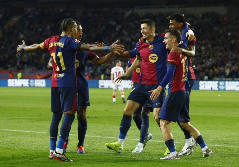 Soccer Football - LaLiga - FC Barcelona v Sevilla - Estadi Olimpic Lluis Companys, Barcelona, Spain - October 20, 2024 FC Barcelona's Robert Lewandowski celebrates scoring their first goal with teammates,Image: 924059583, License: Rights-managed, Restrictions: , Model Release: no, Credit line: Albert Gea / Reuters / Forum