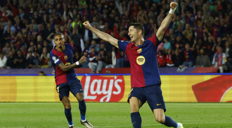 Soccer Football - Champions League - FC Barcelona v Bayern Munich - Estadi Olimpic Lluis Companys, Barcelona, Spain - October 23, 2024 FC Barcelona's Raphinha celebrates scoring their third goal with Robert Lewandowski,Image: 925502978, License: Rights-managed, Restrictions: , Model Release: no, Credit line: Albert Gea / Reuters / Forum