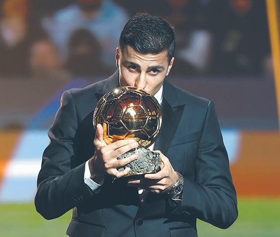 Soccer Football - Ballon d'Or - Theatre du Chatelet, Paris, France - October 28, 2024 Spain's and Manchester City's Rodri with the Ballon d'Or,Image: 927539396, License: Rights-managed, Restrictions: , Model Release: no, Credit line: Sarah Meyssonnier / Reuters / Forum