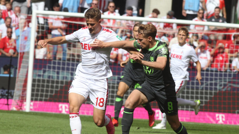 Nicolas Cozza of VfL Wolfsburg (R) and Cologne's Rasmus Carstensen during the Bundesliga match between VfL Wolfsburg and FC Koeln at RheinEnergieStadion 
( Final score; VfL Wolfsburg 2:1 FC Koeln ) (Photo by Osama Faisal / SOPA Images/Sipa USA)
2023.08.26 Koeln
pilka nozna liga niemiecka
FC Koeln - VfL Wolfsburg
Foto SOPA Images/SIPA USA/PressFocus

!!! POLAND ONLY !!!