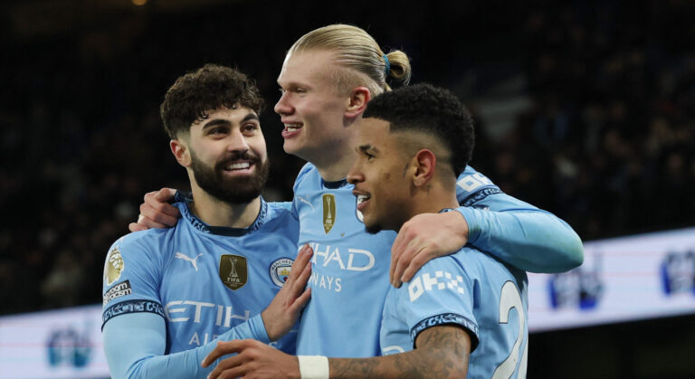 Soccer Football - Premier League - Manchester City v West Ham United - Etihad Stadium, Manchester, Britain - January 4, 2025 Manchester City's Erling Haaland celebrates scoring their third goal with Savinho and Josko Gvardiol  EDITORIAL USE ONLY. NO USE WITH UNAUTHORIZED AUDIO, VIDEO, DATA, FIXTURE LISTS, CLUB/LEAGUE LOGOS OR 'LIVE' SERVICES. ONLINE IN-MATCH USE LIMITED TO 120 IMAGES, NO VIDEO EMULATION. NO USE IN BETTING, GAMES OR SINGLE CLUB/LEAGUE/PLAYER PUBLICATIONS. PLEASE CONTACT YOUR ACCOUNT REPRESENTATIVE FOR FURTHER DETAILS..,Image: 951753362, License: Rights-managed, Restrictions: NO USE WITH UNAUTHORIZED AUDIO, VIDEO, DATA, FIXTURE LISTS, CLUB/LEAGUE LOGOS OR “LIVE” SERVICES. ONLINE IN-MATCH USE LIMITED TO 45 IMAGES, NO VIDEO EMULATION. NO USE IN BETTING, GAMES OR SINGLE CLUB/LEAGUE/PLAYER PUBLICATIONS., Model Release: no, Credit line: Phil Noble / Reuters / Forum